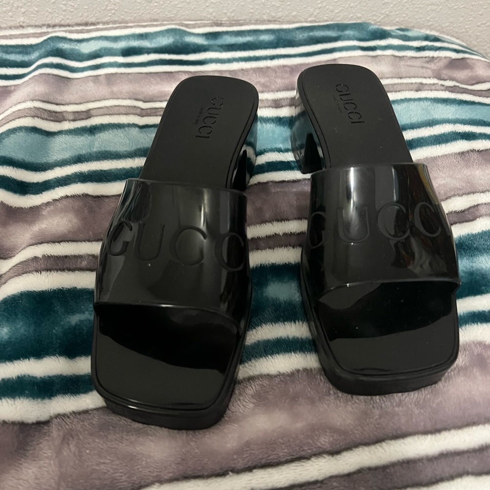 Authentic Gucci rubber heels. These do show signs of wear, as seen in photos.